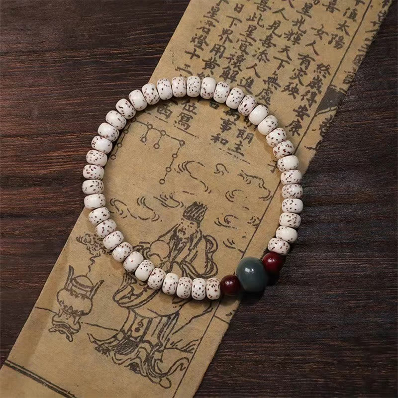 Buddha Stones菩提樹の小さな葉の紫檀の知恵のブレスレット