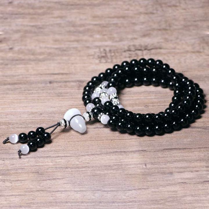 Buddha Stonesブラックオニキス ホワイトクリスタルビーズ 瞑想ブレスレット