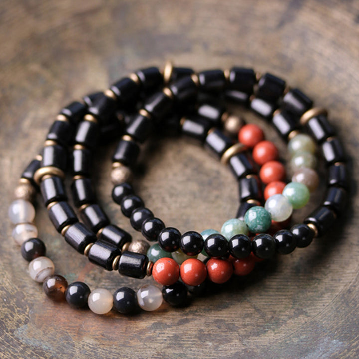 Buddha Stones、黒檀、赤ジャスパー、苔瑪瑙、水晶、銅、平和のカップルブレスレット