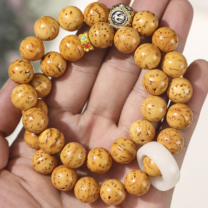 Buddha Stonesチベット天然紫金鼠菩提樹の富ダブルラップブレスレット