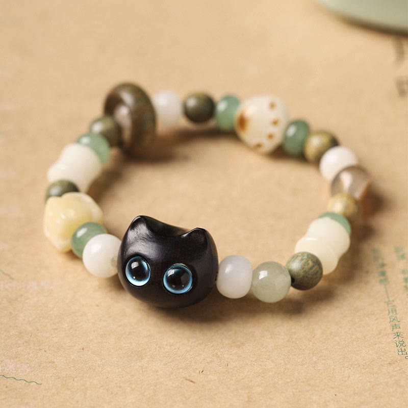 Buddha Stones菩提樹 緑白檀黒檀小葉紫檀猫の頭 足爪 平和ブレスレット - 黒檀の猫（青い目）（手首周り14～16cm） - image 1