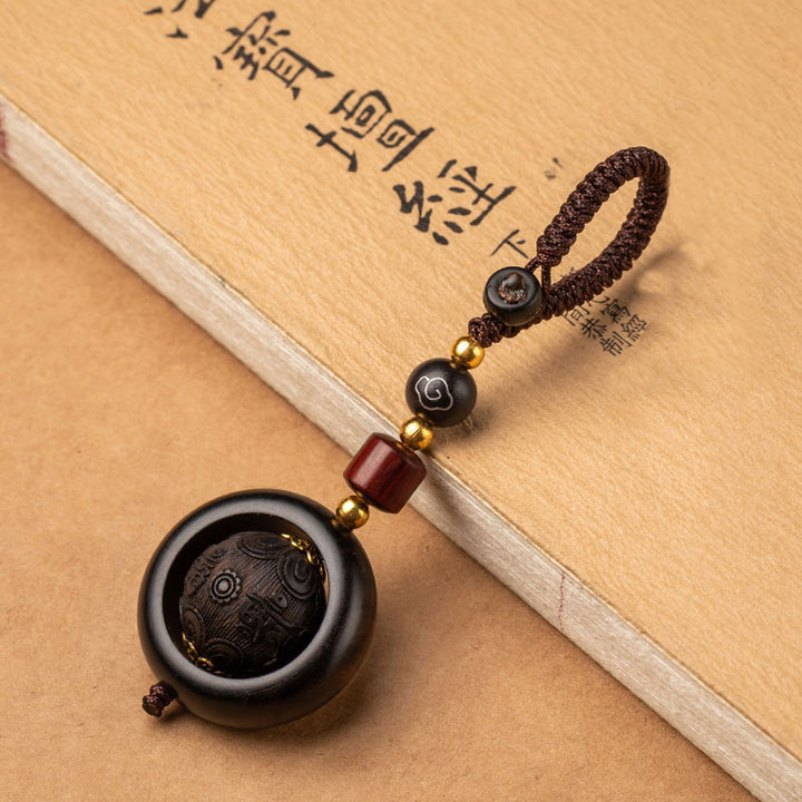 Buddha Stonesチベット小葉 紫檀 黒檀 幸運 守護 回転飾り