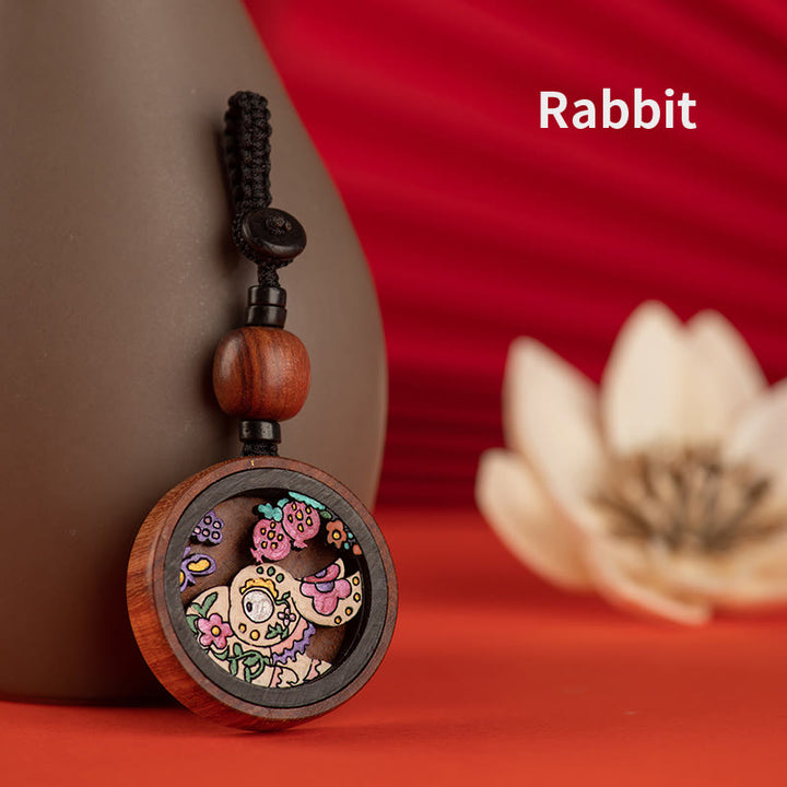 龍の年を描いたBuddha Stonesの手描きの干支ローズウッド彫刻の落ち着いたキーホルダー