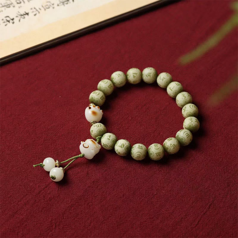 Buddha Stonesグリーン菩提樹の種 猫の足跡 オム・オーム・マニ・パドメ・フム刻印入り 知恵のブレスレット - 菩提樹（吉兆♥幸運） - image 1
