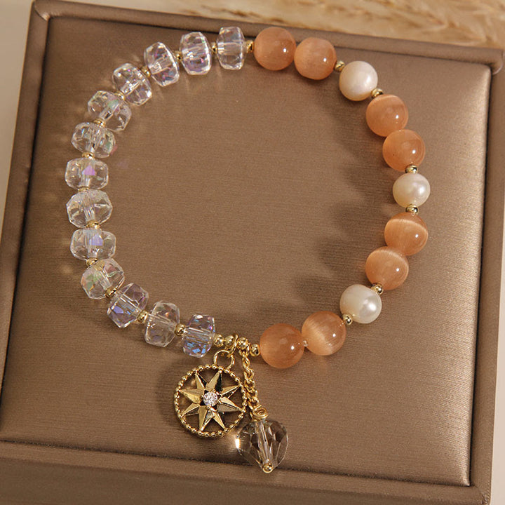 Buddha Stonesオレンジキャッツアイ ホワイトクリスタル スターサポートブレスレット