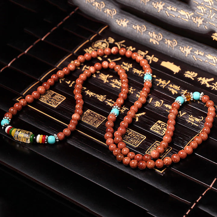 Buddha Stones 108Malaビーズ ゴールドストーンOm Mani Padme Humスワスティカ 自信のブレスレット