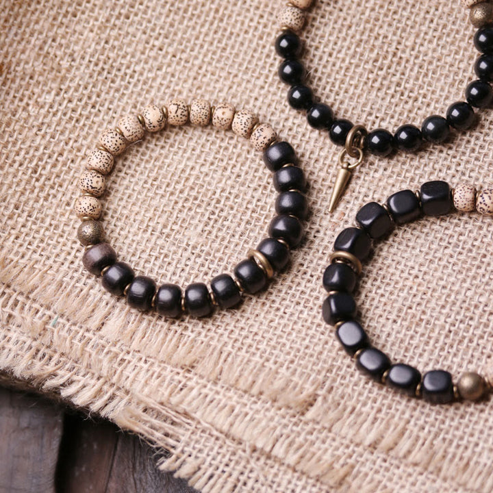 Buddha Stonesチベット菩提樹 黒曜石 黒檀 木 銅 平和ブレスレット