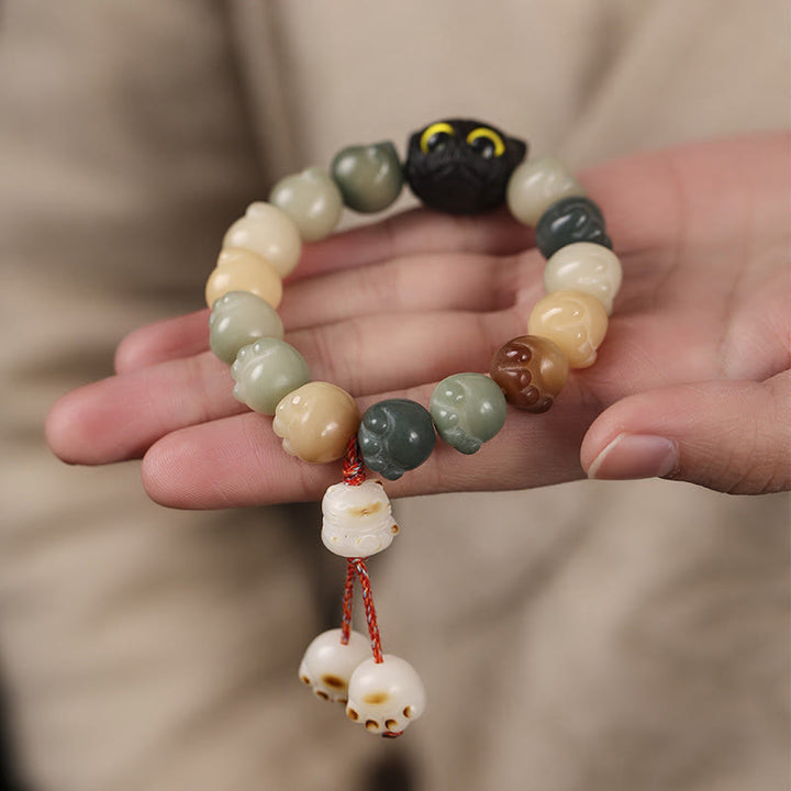 Buddha Stones天然菩提樹 愛らしい足跡黒檀招き猫 知恵のブレスレット - image 11