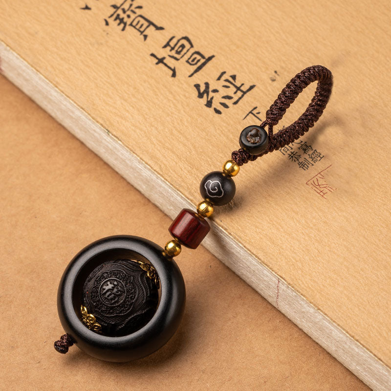 Buddha Stonesチベット小葉 紫檀 黒檀 幸運 守護 回転飾り