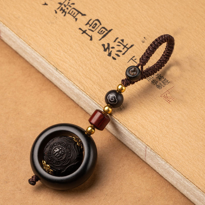 Buddha Stonesチベット小葉 紫檀 黒檀 幸運 守護 回転飾り