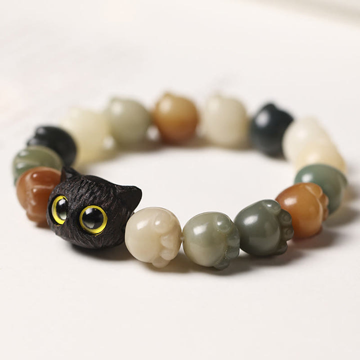 Buddha Stones天然菩提樹 愛らしい足跡黒檀招き猫 知恵のブレスレット - image 2