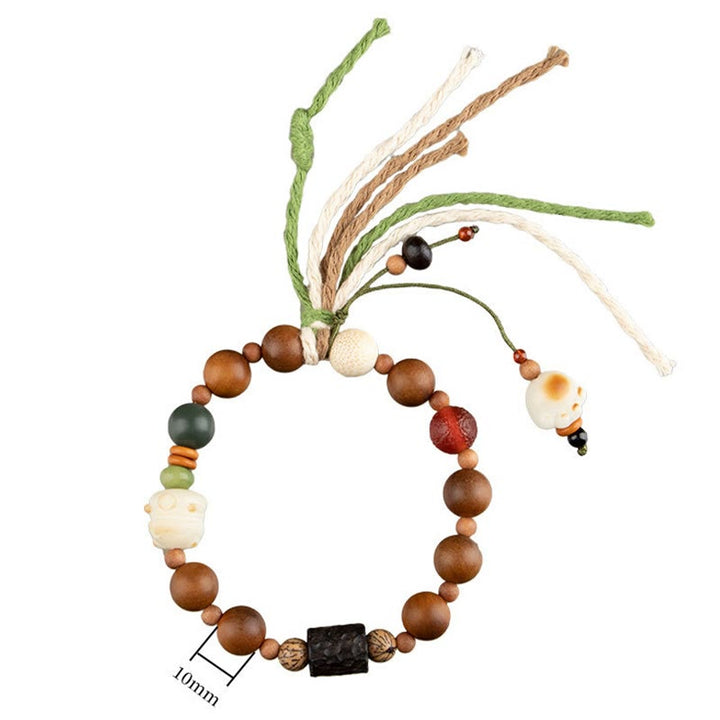 Buddha Stones雷撃 木製 菩提樹 猫の足爪 縁起物 守護 タッセルブレスレット - image 10