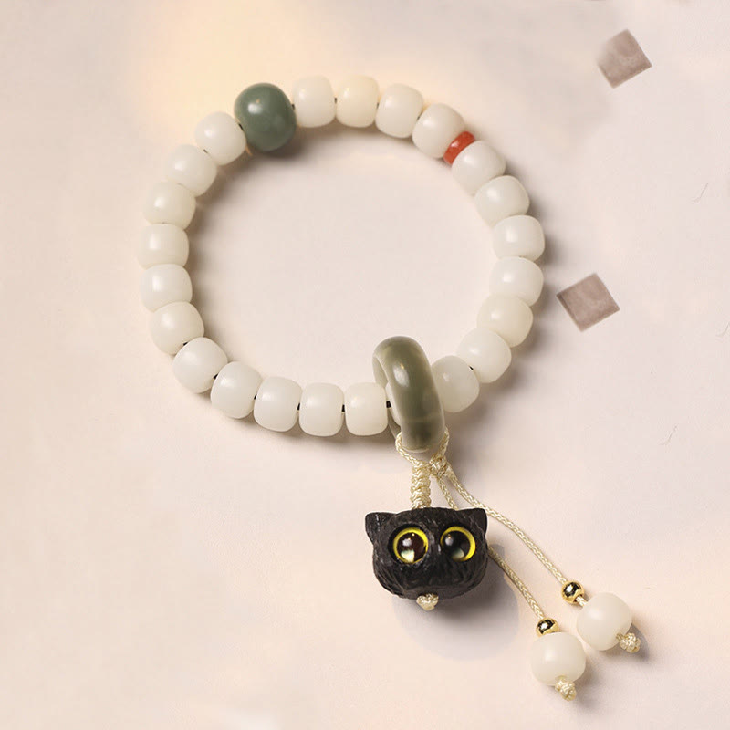 Buddha Stones天然菩提樹 アフリカンブラックウッド 愛らしい猫のチャーム 平和と調和のブレスレット - イエローアイズキャット 菩提の種 - image 1