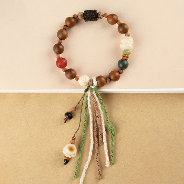 Buddha Stones雷撃 木製 菩提樹 猫の足爪 縁起物 守護 タッセルブレスレット - image 6