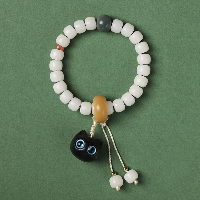 Buddha Stones天然菩提樹 アフリカンブラックウッド 愛らしい猫のチャーム 平和と調和のブレスレット - ブルーアイズキャット 菩提の種 - image 6