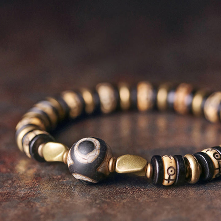 Buddha Stonesチベット骨ビーズ 黒檀 強さのブレスレット