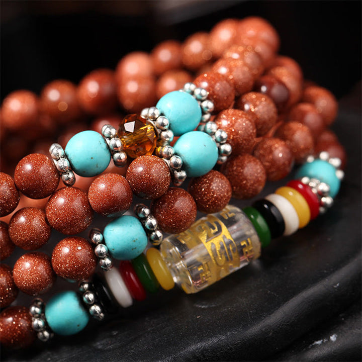 Buddha Stones 108Malaビーズ ゴールドストーンOm Mani Padme Humスワスティカ 自信のブレスレット