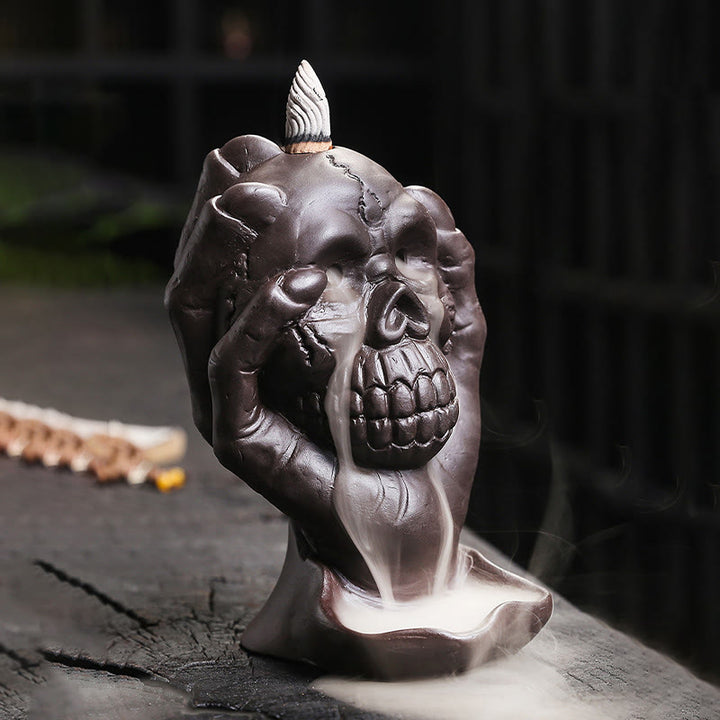 ハロウィンのBuddha Stonesとゴーストハンドの頭蓋骨、紫粘土のスピリチュアルな香炉の装飾