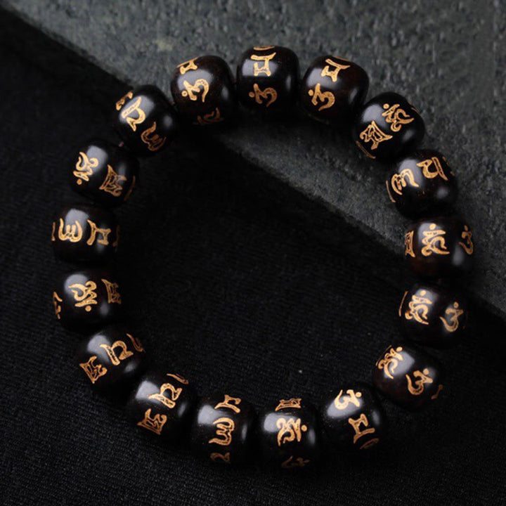 Buddha Stonesチベット黒檀オーム・マニ・パドメ・フム彫刻 平和ブレスレット