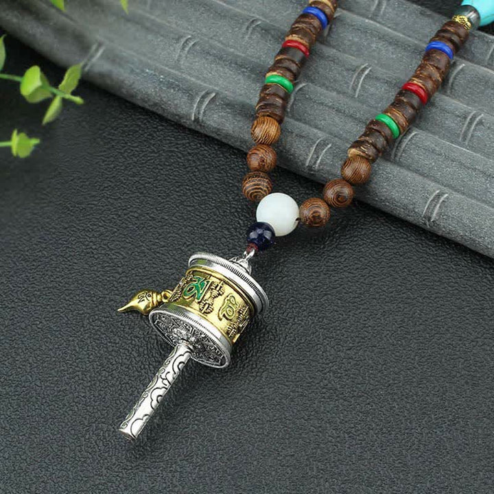 Buddha Stonesチベットオーム・マニ・パドメ・フム祈祷ホイール回転 金剛杵 木製ネックレス ペンダント - 金の祈祷ホイール - image 1