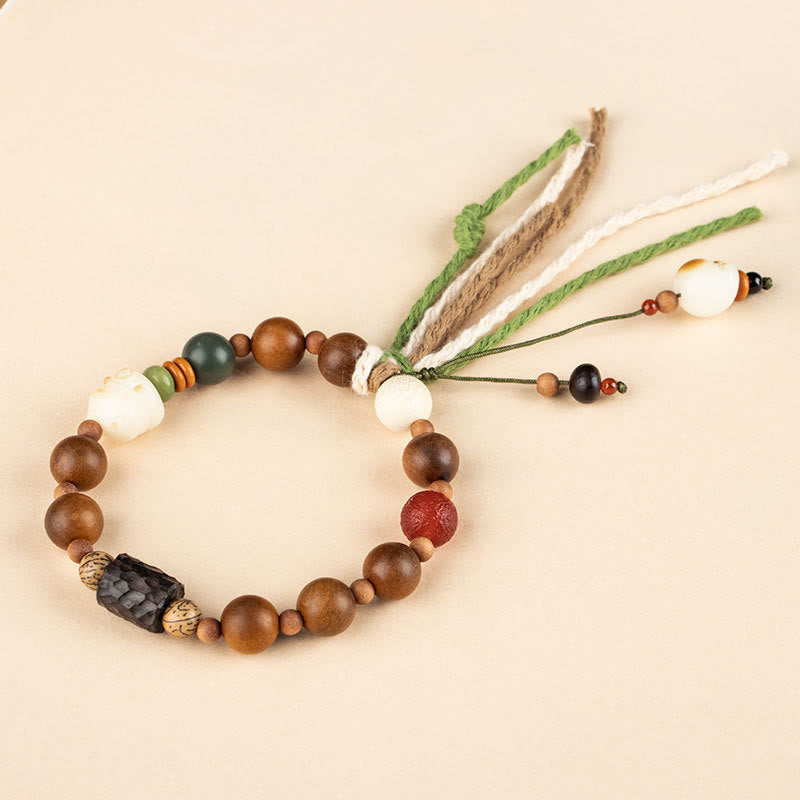 Buddha Stones雷撃 木製 菩提樹 猫の足爪 縁起物 守護 タッセルブレスレット - image 8