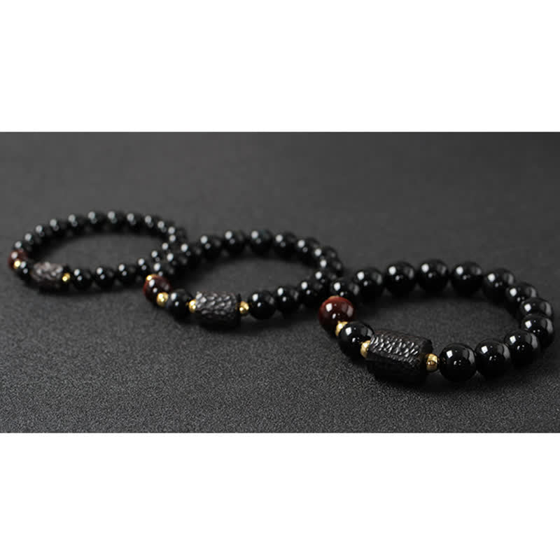 黒曜石、黒檀、赤虎目石の強さを秘めたカップルブレスレット