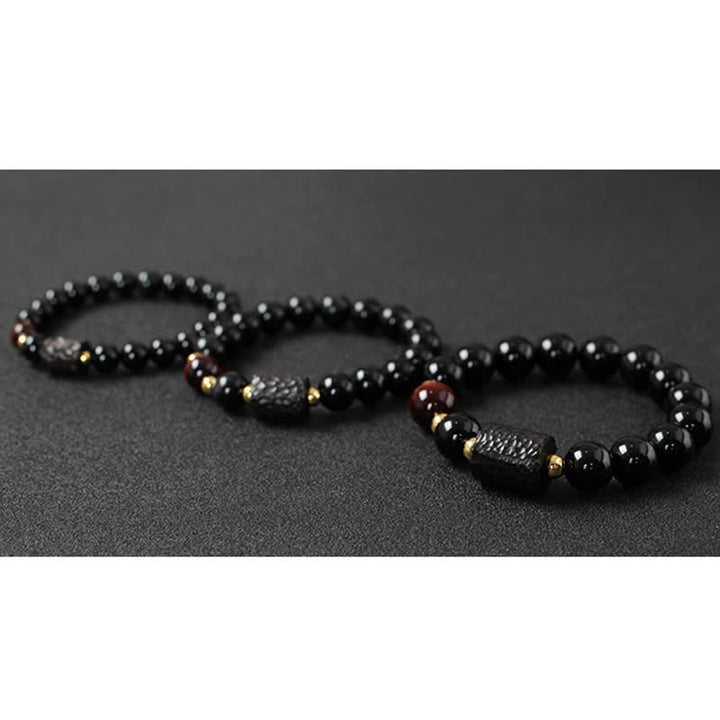 黒曜石、黒檀、赤虎目石の強さを秘めたカップルブレスレット