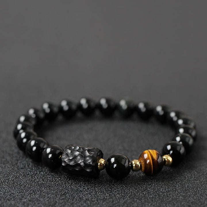 黒曜石、黒檀、赤虎目石の強さを秘めたカップルブレスレット