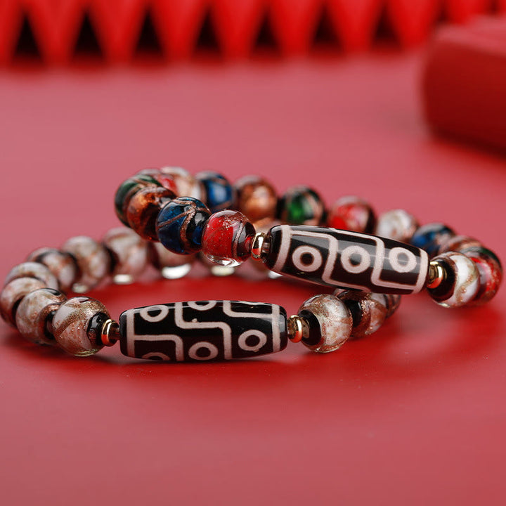 Buddha Stonesチベット九眼珠三眼珠琉璃ガラス玉富のブレスレット