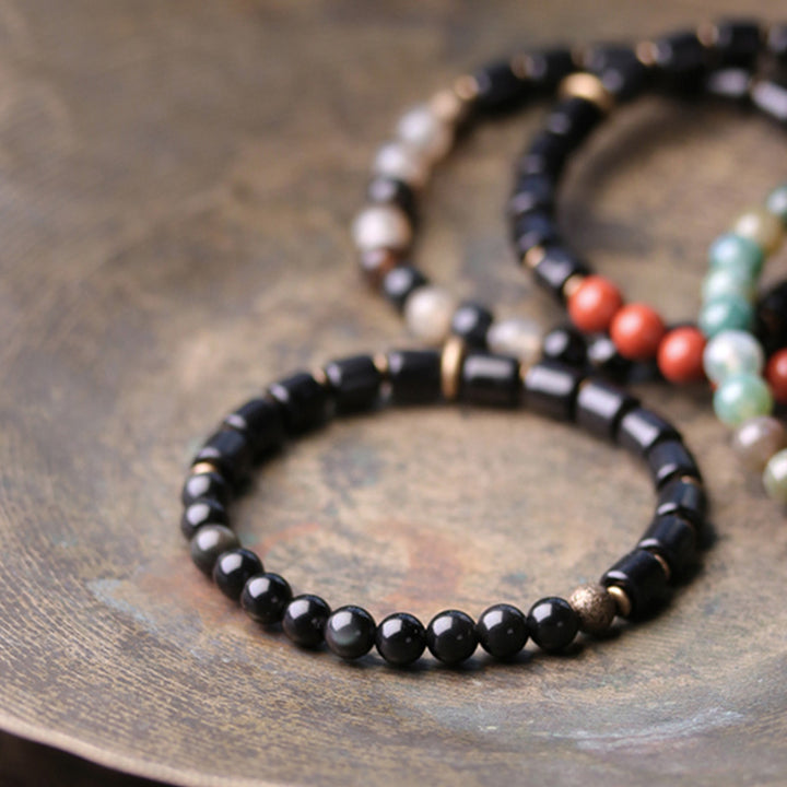 Buddha Stones、黒檀、赤ジャスパー、苔瑪瑙、水晶、銅、平和のカップルブレスレット