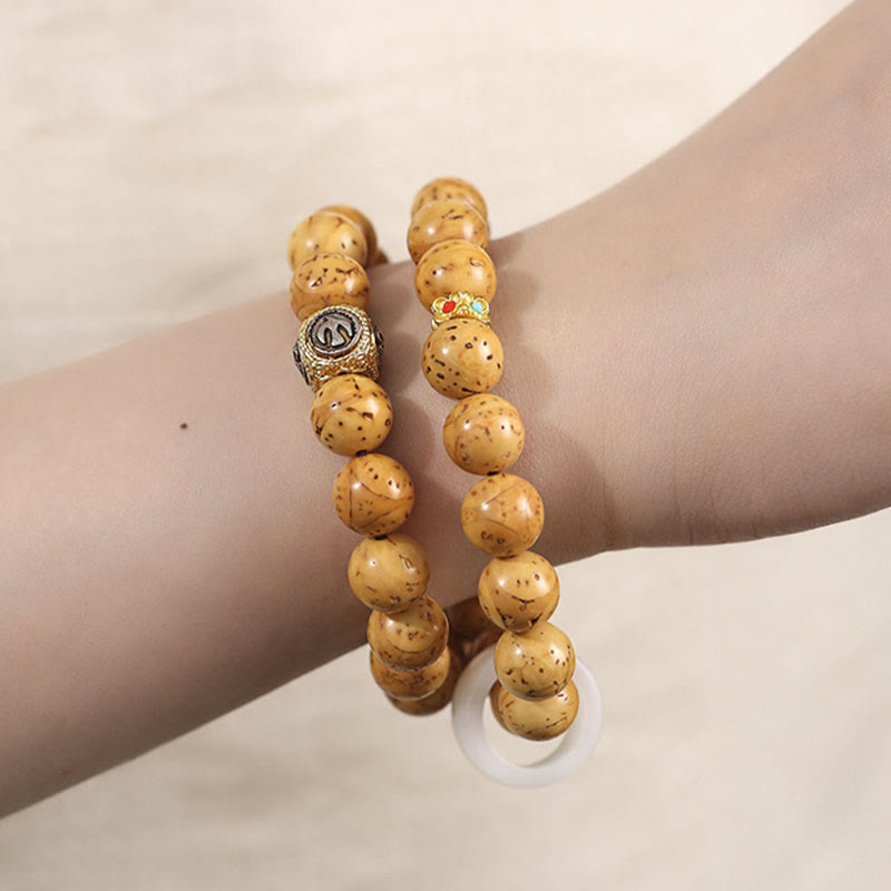 Buddha Stonesチベット天然紫金鼠菩提樹の富ダブルラップブレスレット