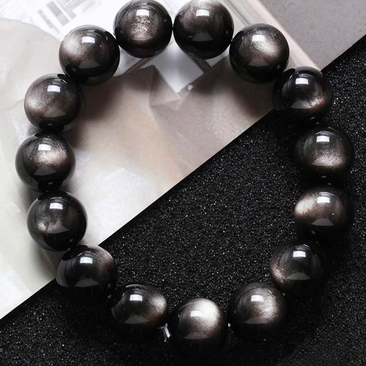 Buddha Stones天然銀光沢黒曜石 癒しの保護ブレスレット