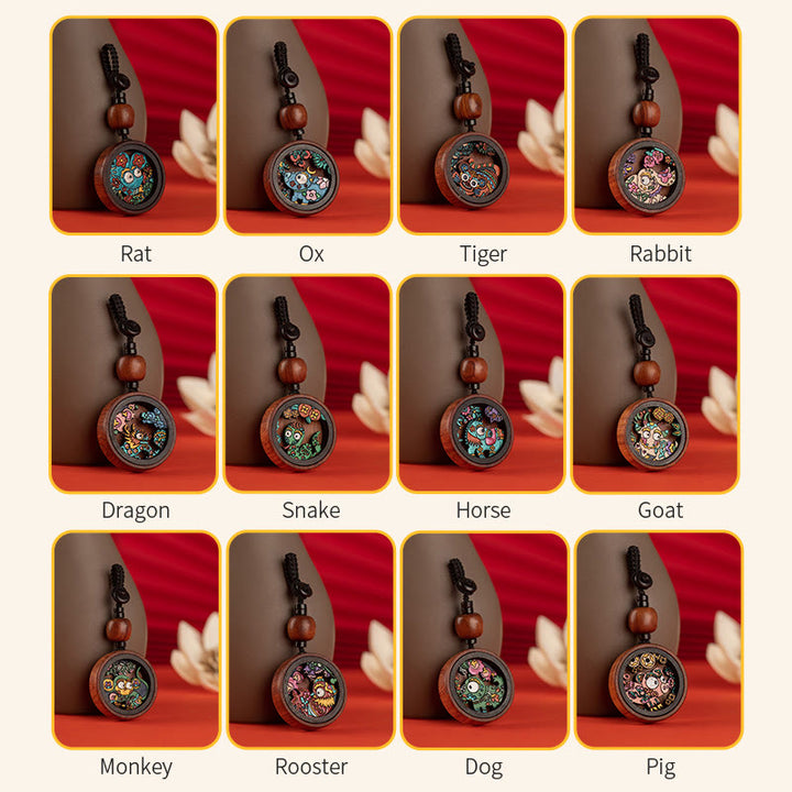 龍の年を描いたBuddha Stonesの手描きの干支ローズウッド彫刻の落ち着いたキーホルダー